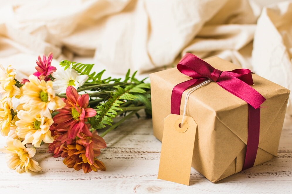 Elegant gourmet gift boxes with wine, honey, and ribbons for holidays and special occasions